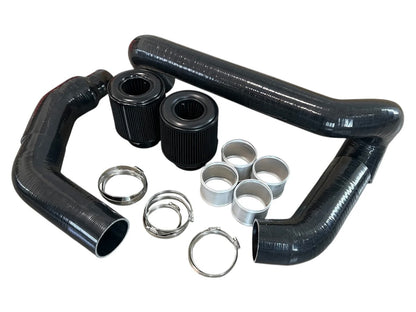 Dual high-flow performance filters behind front grille of BMW M4