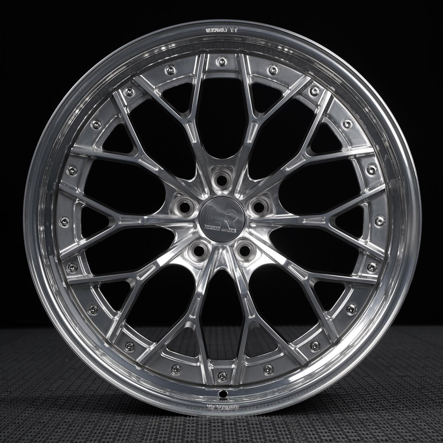Car wheel rim on a black background
