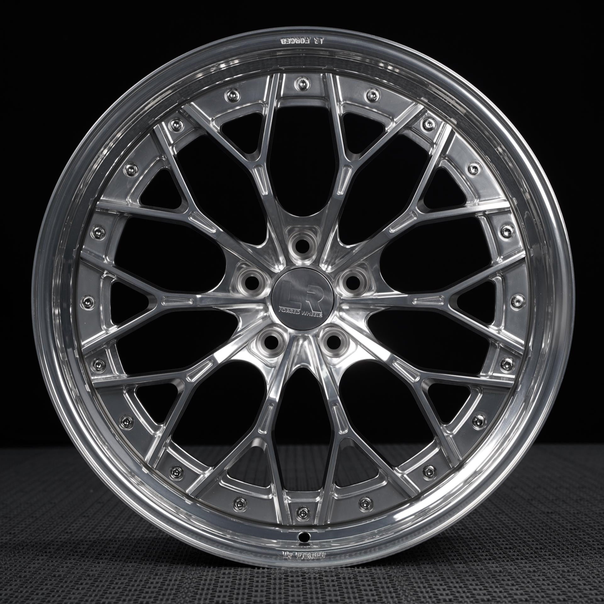 Car wheel rim on a black background